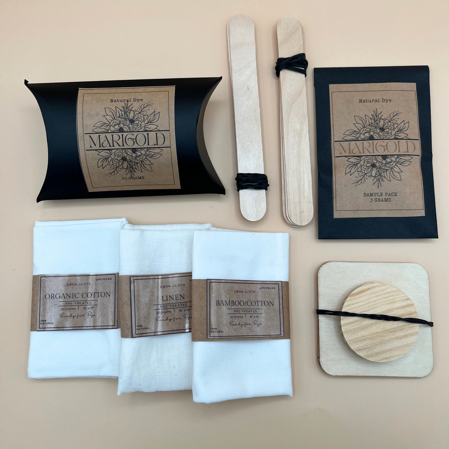 Complete natural dye textile kit, includes 3 different undyed fabric types, marigold dye, step-by-step instructional booklet, and resist dyeing tools—perfect for beginners and fiber artists exploring botanical fabric dyeing.